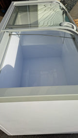 New Air NIF-56-CG 56in Curved Glass Island Freezer